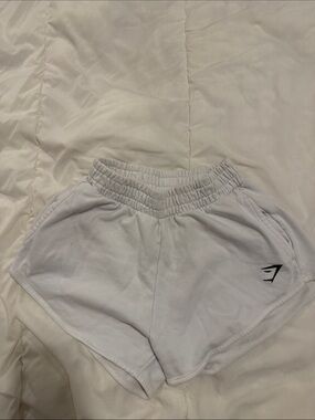 Gymshark Kids White Athletic Shorts with Black Logo